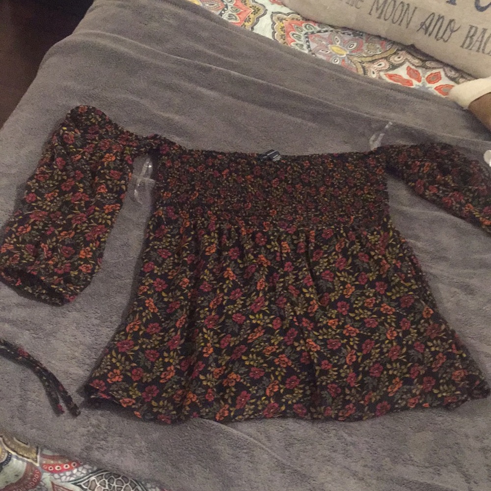 Off shoulder top. Never worn. No tags